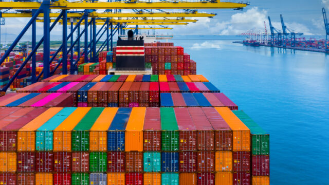 Aerial view container ship at deep terminal seaport